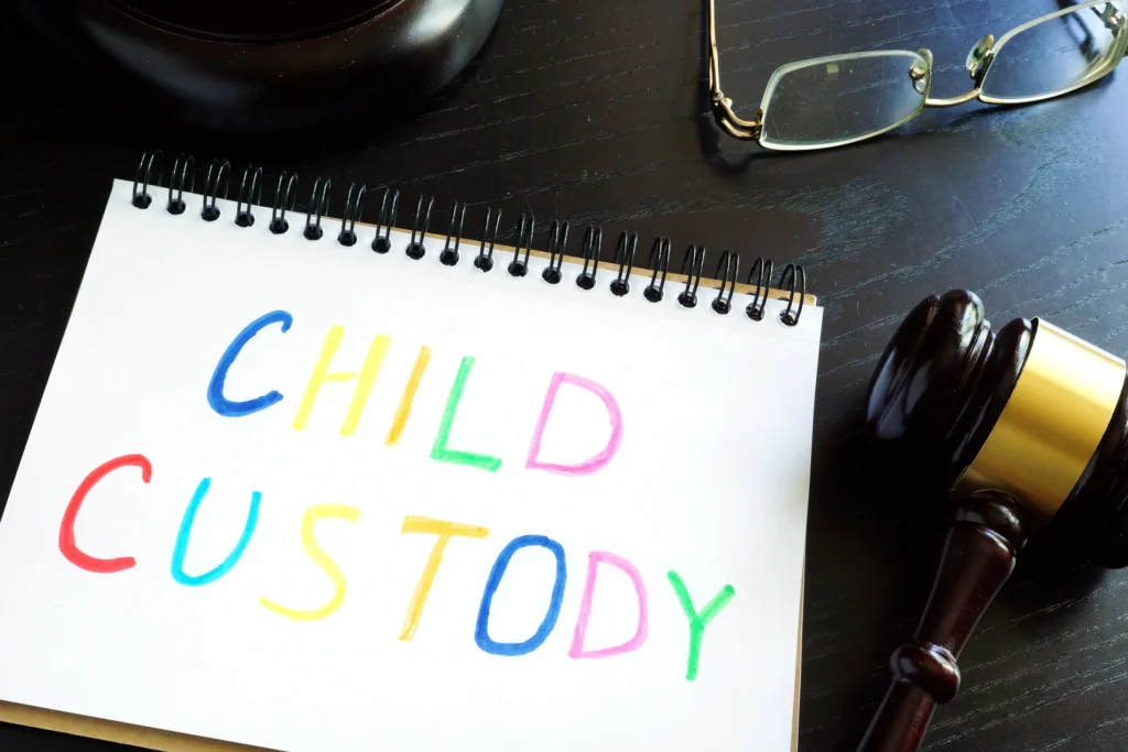 Child Custody written in crayon on paper.