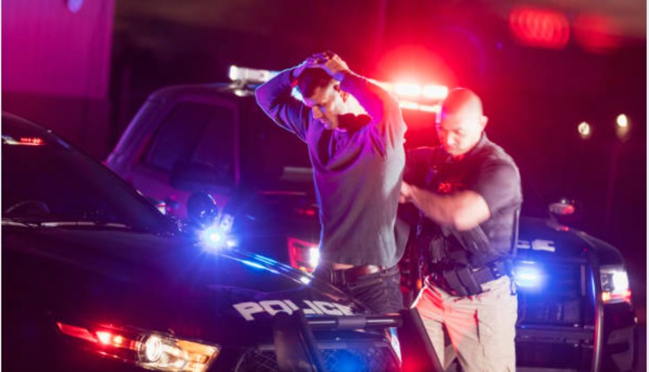 A man getting arrested.
