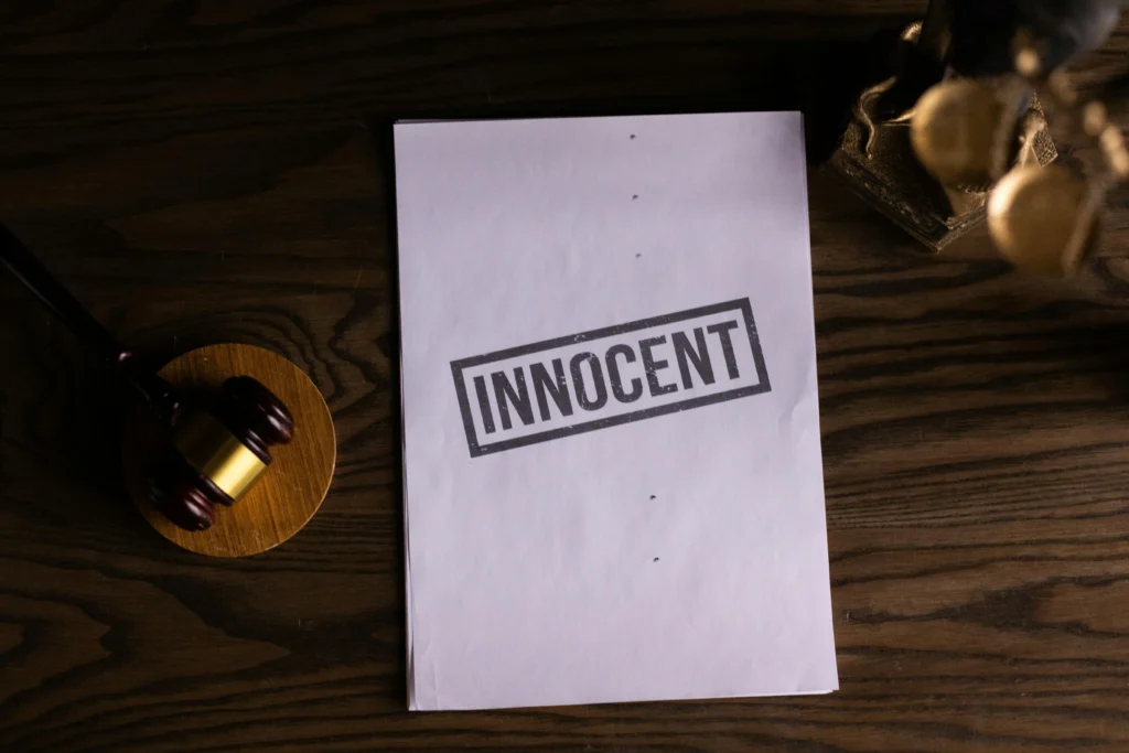 gavel and paper that says innocent